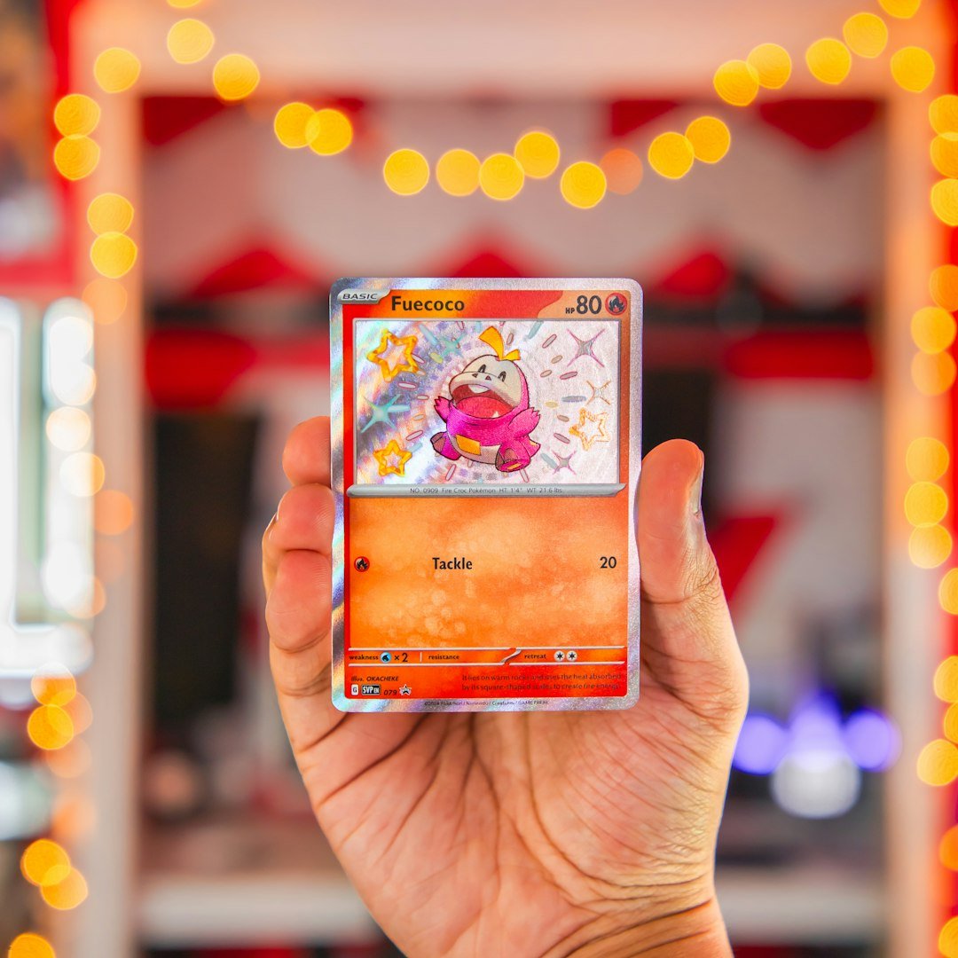 Hand holding a trading card
